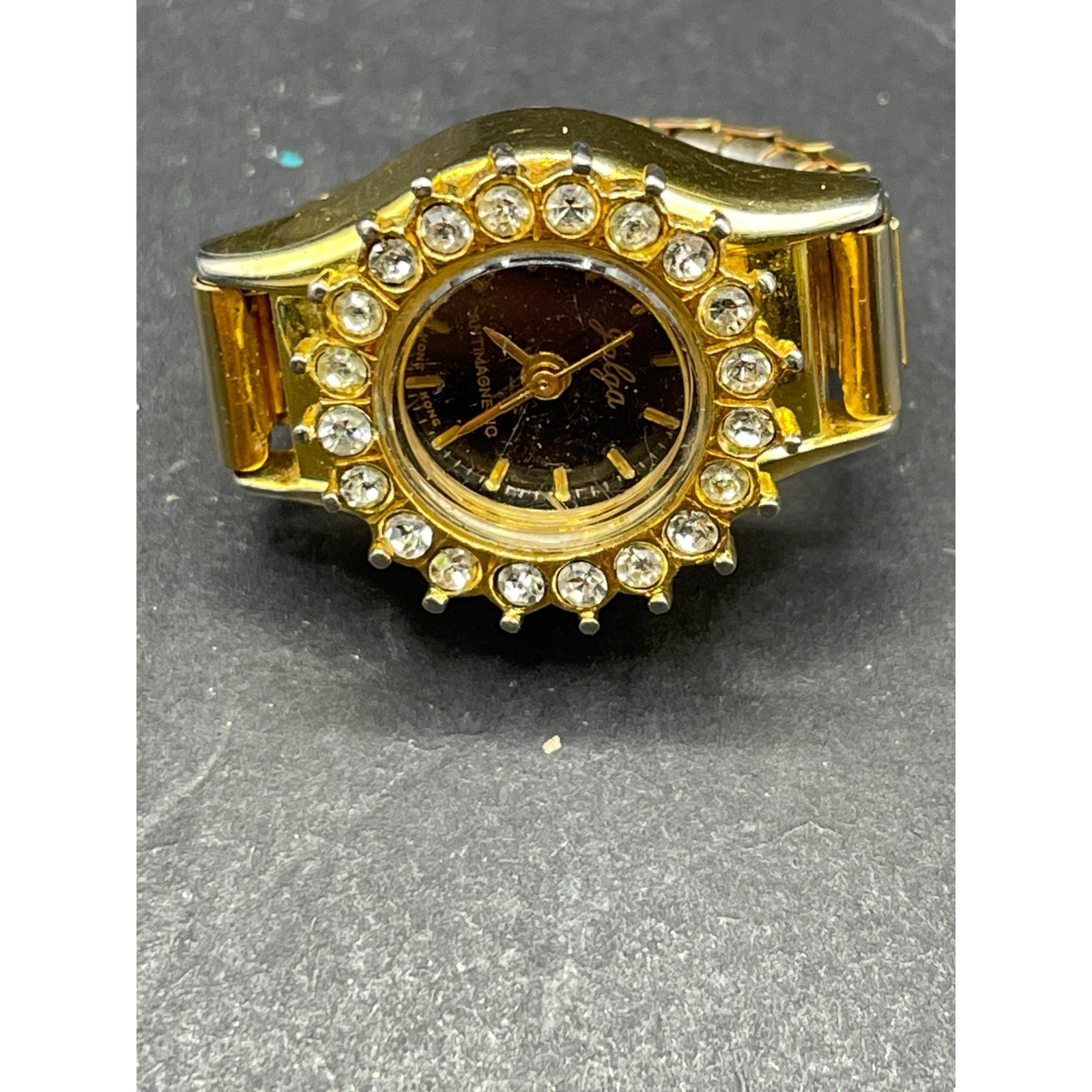 Vintage Jalga Gold Tone Ring Watch Stretch Band Black Dial Crystal Bezel